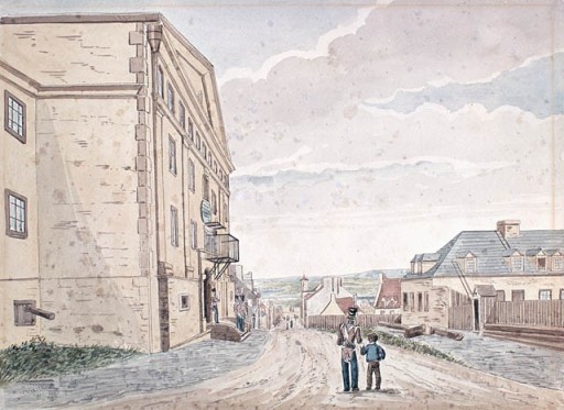 La prison sur la rue Saint-Stanislas (Québec ) v. 1830 par James Pattison Cockburn. Source: Bibliothèque et Archives Canada